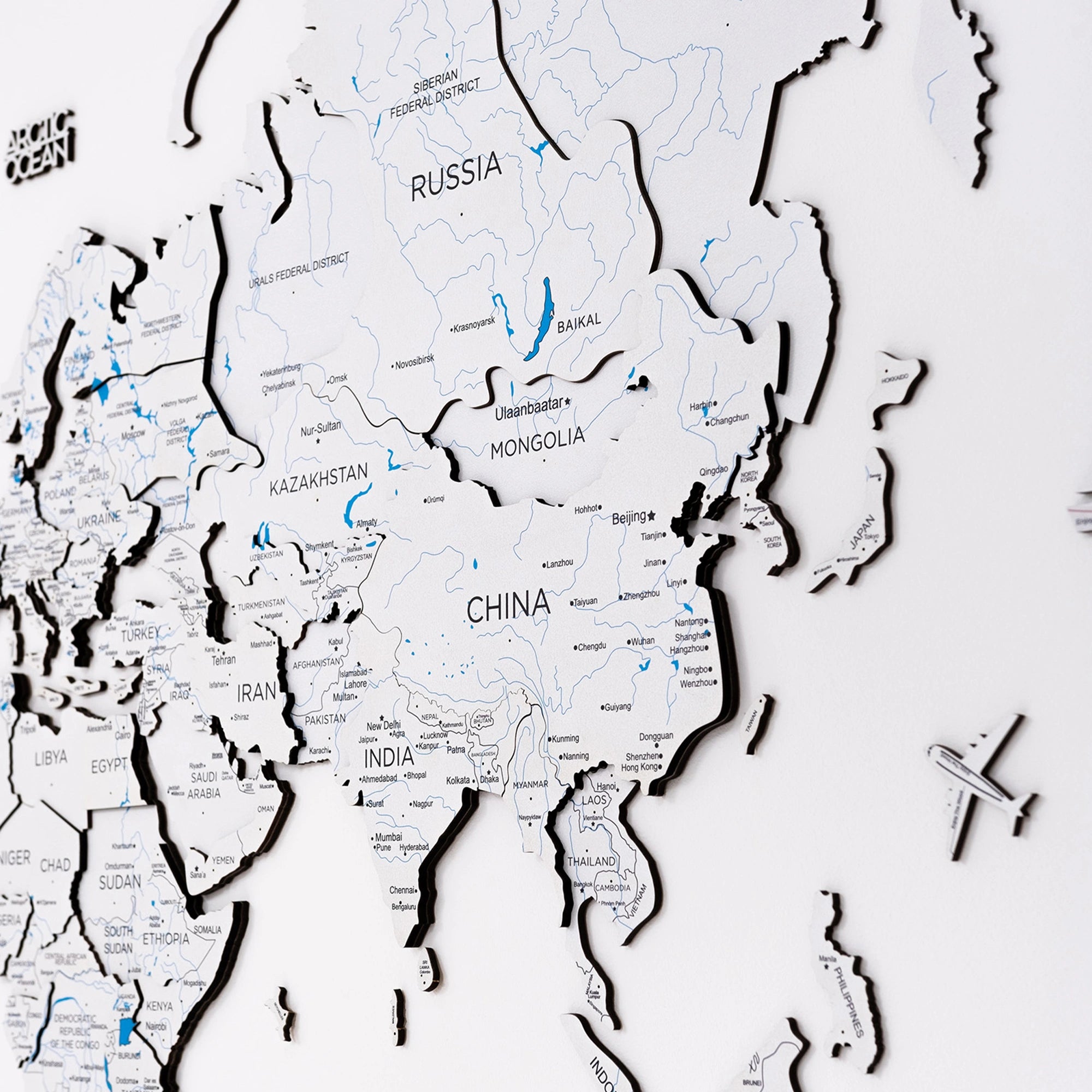 White Wooden World Map - Premium wall art for marking adventures.