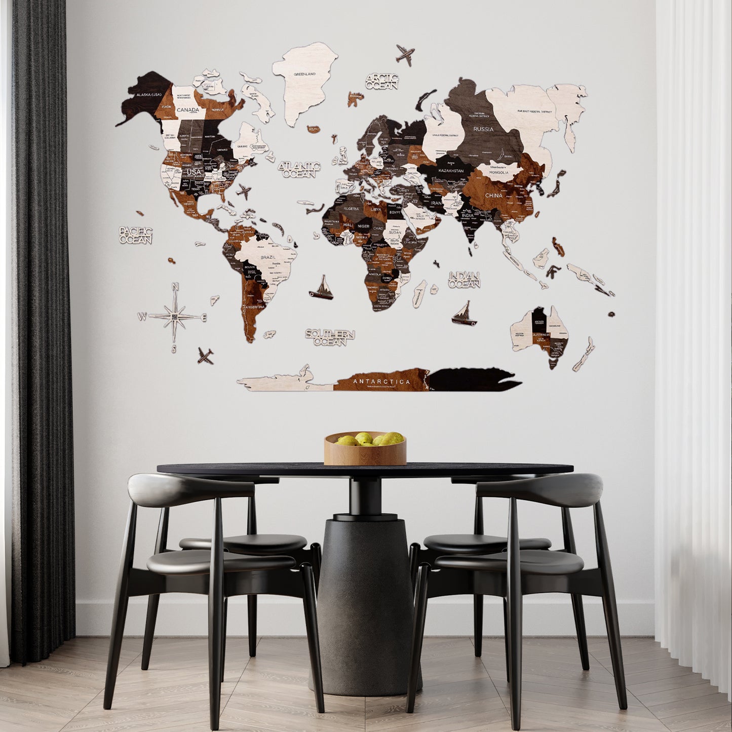 World map wall decal in a dining room with a table and chairs.