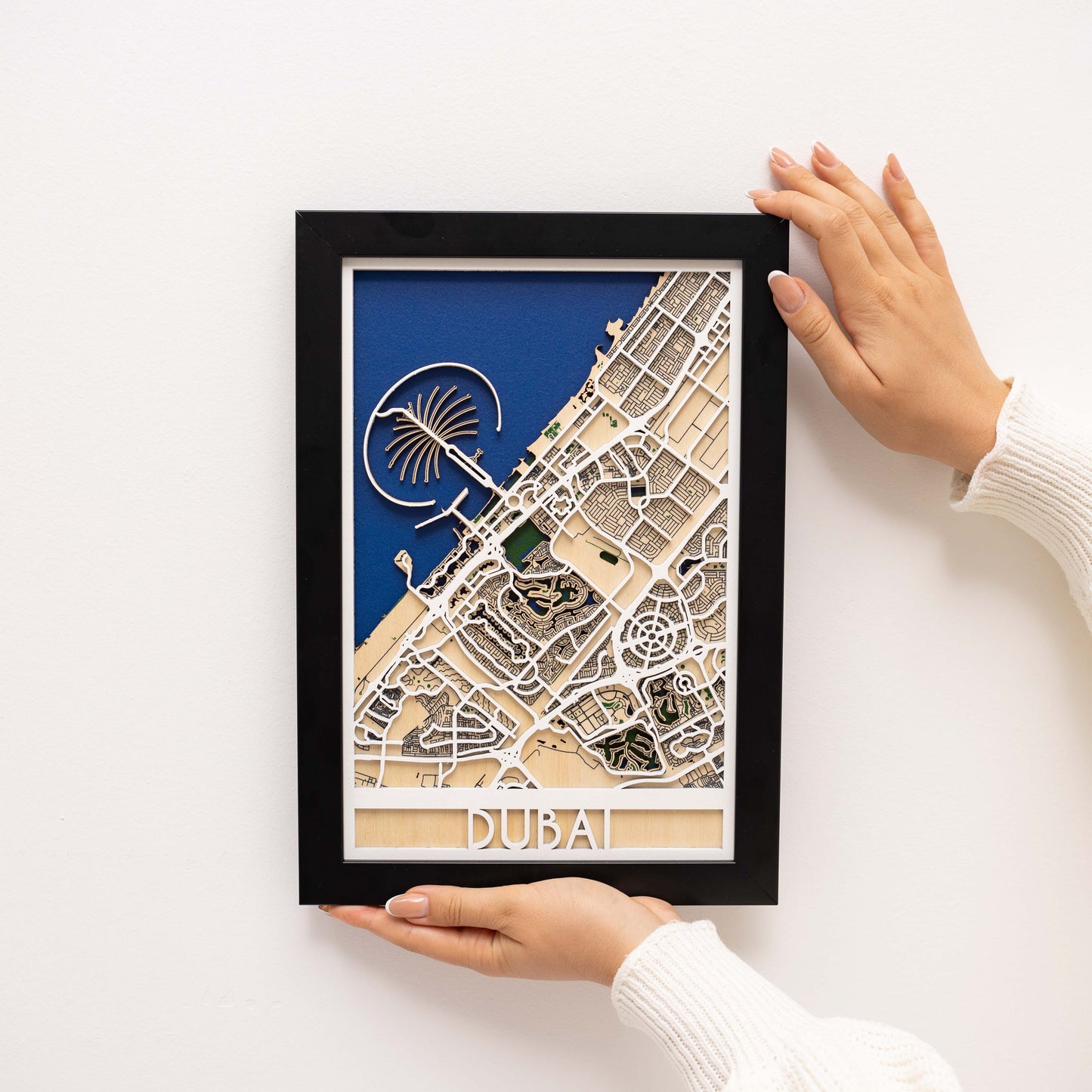 Detailed 3D wooden Dubai map – layered design for modern interior wall décor