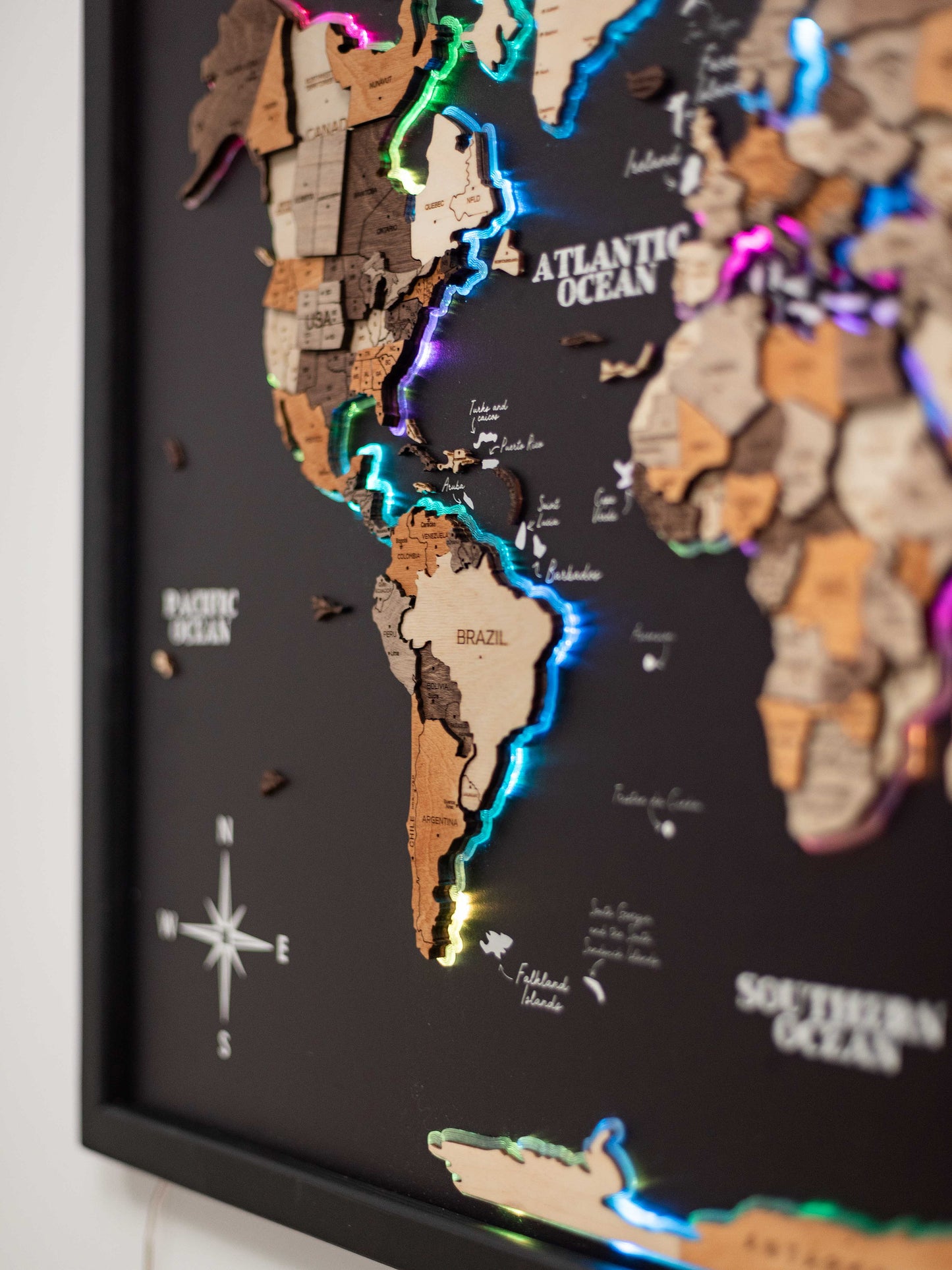 Handcrafted black panel wooden world map – multicolor LED lighting for interiors
